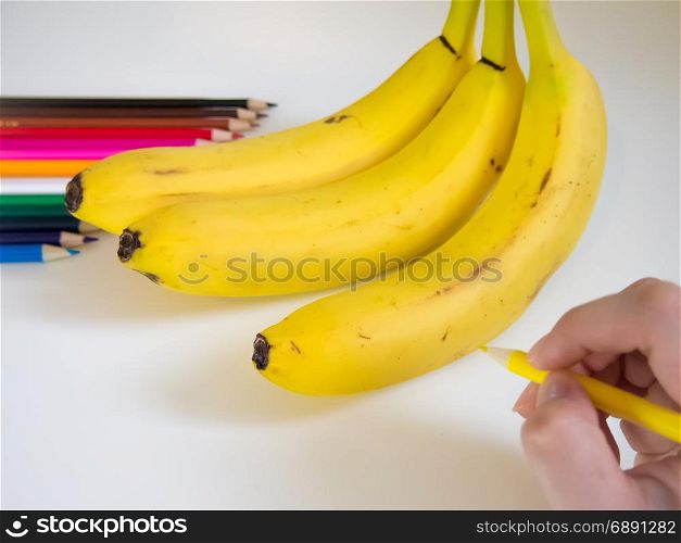 looks like drawing bananas with the colored pencil