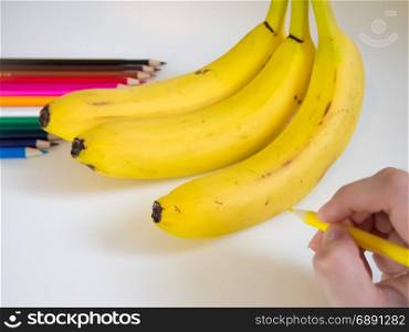 looks like drawing bananas with the colored pencil