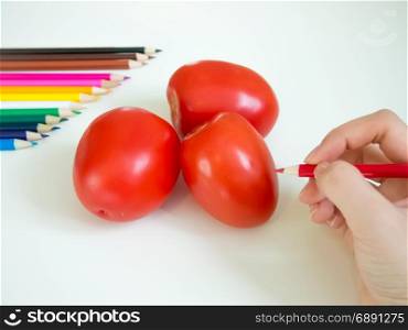 looks like drawing tomatos with the colored pencil