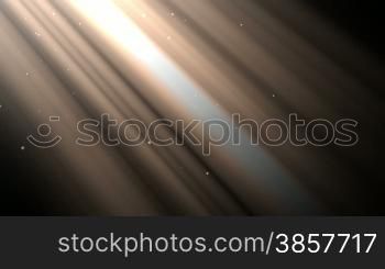 Looping animation with light rays and dust particles over black background