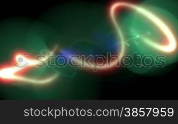 Looping animation with randomly moving lights leaving a glowing light trail over a black background