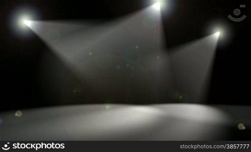 Looping animation with three spotlights sweeping the floor on a black background