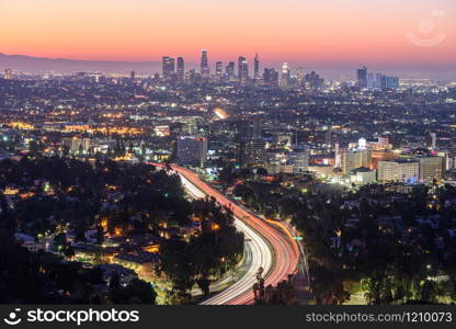 Los Angeles freeway traffic at sunrise