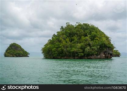 Los Haitises National Park nicknamed the Caribbean&rsquo;s Halong Bay.Mangroves, caves, a rich tropical forest, multicolored tropical birds and manatees. The coast is dotted with small islets where frigates and pelicans nest.Samana peninsula, Dominican Republic.