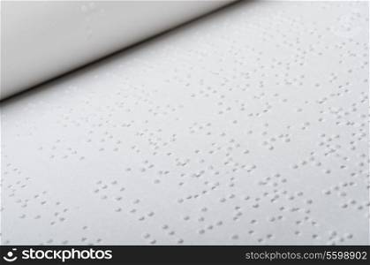 ?lose up of open book written in braille