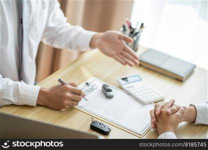 Loss Adjuster Insurance Agent Inspecting Damaged Car. 
Sales manager giving advice application form document considering mortgage loan offer for car  insurance.