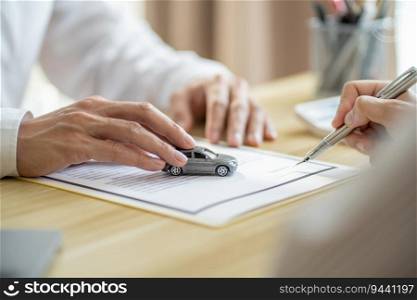 Loss Adjuster Insurance Agent Inspecting Damaged Car. 
Sales manager giving advice application form document considering mortgage loan offer for car  insurance.