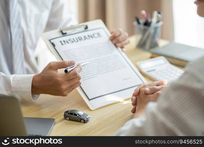 Loss Adjuster Insurance Agent Inspecting Damaged Car. 
Sales manager giving advice application form document considering mortgage loan offer for car  insurance.