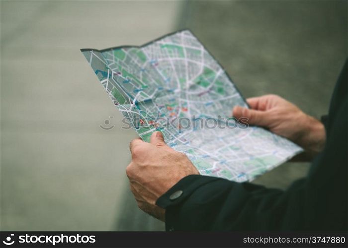 Lost Person Looking a Map