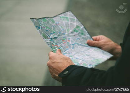 Lost Person Looking a Map