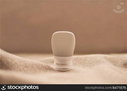 lotion tube mockup isolated on brown background.
