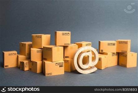 Lots of boxes and email symbol, commercial AT. shopping online. development of Internet network trade, advertising services. E-commerce. sales of goods and services through online trading platforms.
