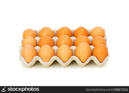 Lots of eggs in the carton isolated on white