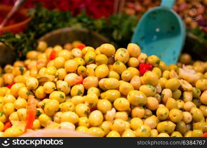 lots of olives in the market like snack and vegtable