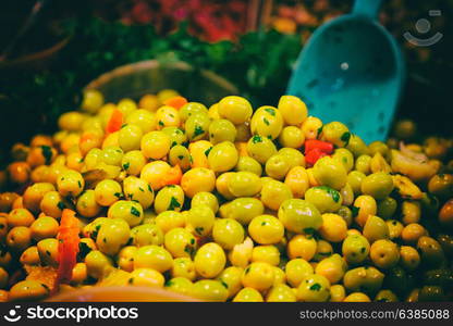 lots of olives in the market like snack and vegtable