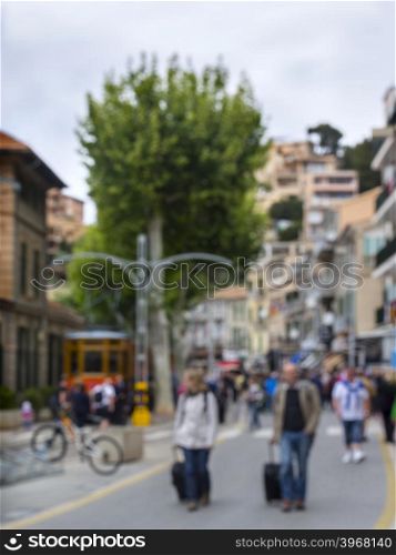 Lots of people, tourists walking on European town , Blur background