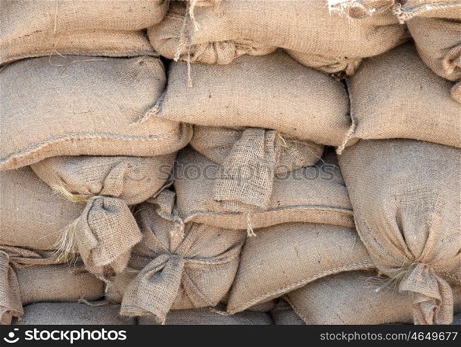 lots of sandbags all piled ready and waiting