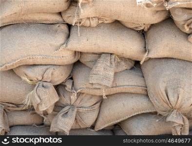 lots of sandbags all piled ready and waiting