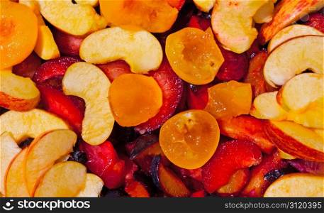 Lots of Sliced Fruit as Background