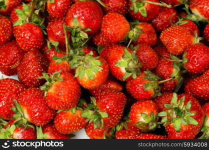 Lots of strawberries arranged as the background