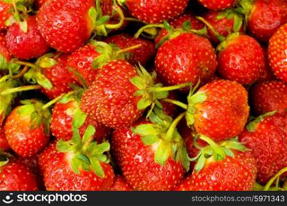 Lots of strawberries arranged as the background