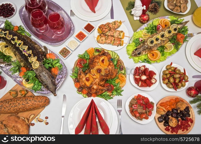 Lots of traditional festive food on table. Christmas table.