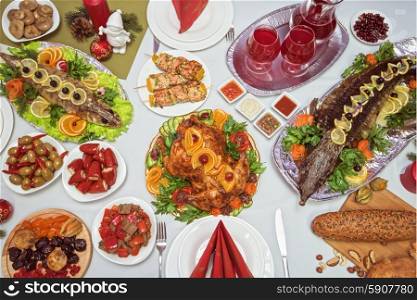 Lots of traditional festive food on table. Christmas table.. traditional festive food