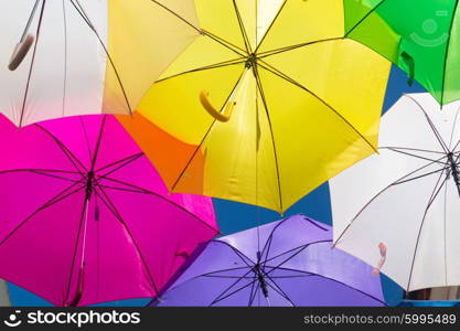 Lots of umbrellas coloring the sky in the city of Agueda, Portugal