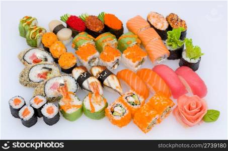 lots of various Japanese sushi and sushi rolls