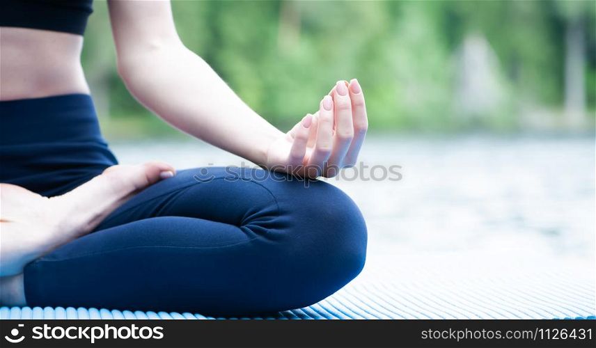Lotus pose, Padmasana close-up, yoga elements with space for text , yoga concept