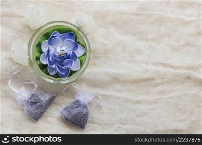 lotus shaped candle pouches with herbs