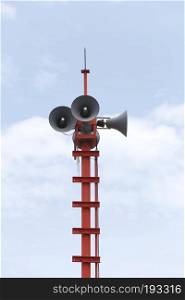 Loudspeakers broadcast alarms on outdoor sky background.
