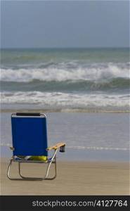 Lounge chair on the beach, Daytona Beach, Florida, USA