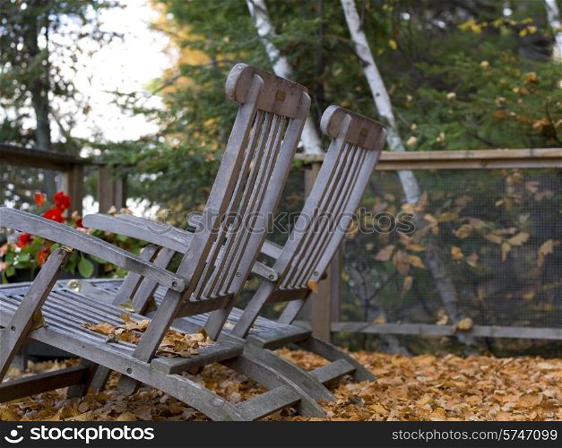 Lounge Chairs on terrace, Lake of The Woods, Ontario, Canada