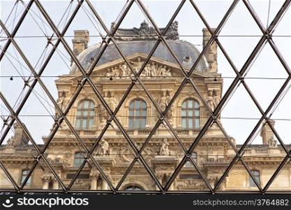 Louvre Museum in Paris through the glass pyramid