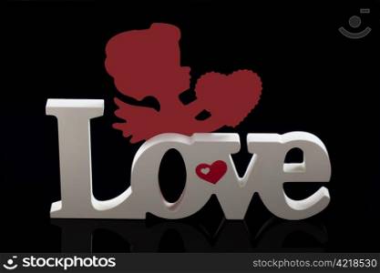 Love and cherub with reflections and copy space