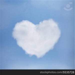 love and relationship concept - blue sky with heart from clouds