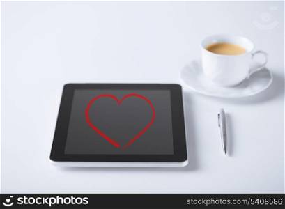 love and technology concept - tablet pc and pen with cup of coffee