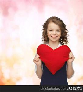 love, children and happiness concept - beautiful girl with big heart