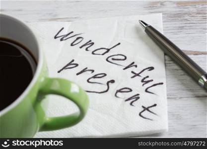 Love confession on napkin. Romantic message written on napkin and cup of coffee on wooden table