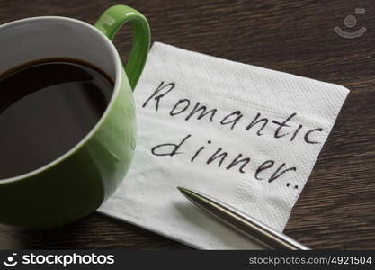 Love confession on napkin. Romantic message written on napkin and cup of coffee on wooden table