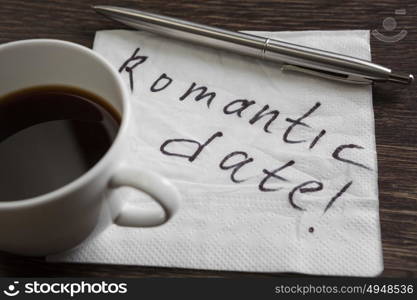 Love confession on napkin. Romantic message written on napkin and cup of coffee on wooden table