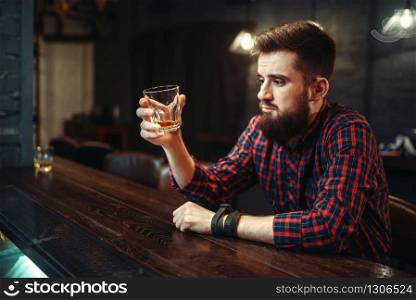 Love couple flirting at wooden bar counter, romantic dinner with paste and red wine. Lovers leisures in pub, husband and wife relaxing together in nightclub. Love couple flirting at wooden bar counter