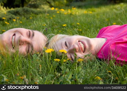 love couple resting on the green grass