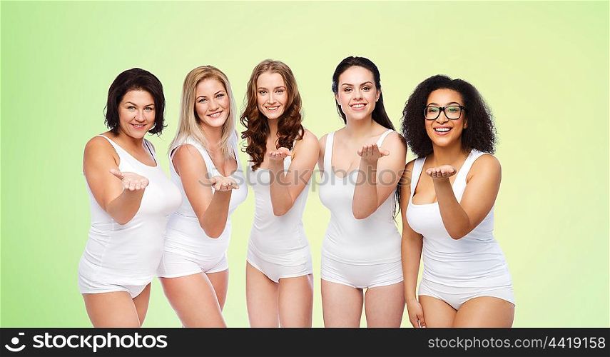 love, friendship, beauty, body positive and people concept - group of happy plus size women in white underwear sending blow kiss