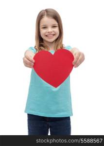 love, happiness and people concept - smiling little girl giving red heart