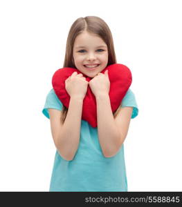 love, happiness and people concept - smiling little girl with red heart