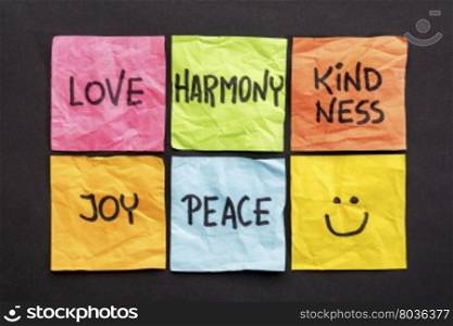 love, harmony kindness, joy and peace - set of sticky notes with inspirational words and smiley