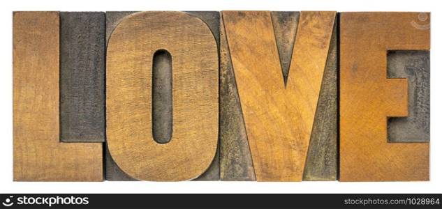 love - isolated word in vintage letterpress wood type, romance concept