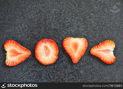 Love Letters Strawberry Slices Isolated On Black Background